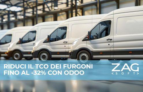 Una fila di furgoni bianchi all'interno di un magazzino spazioso.