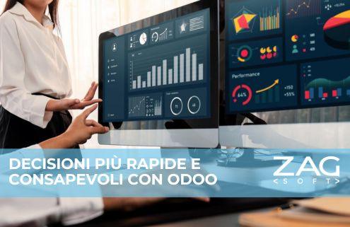 Un uomo e una donna osservano uno schermo di computer con grafici analitici.